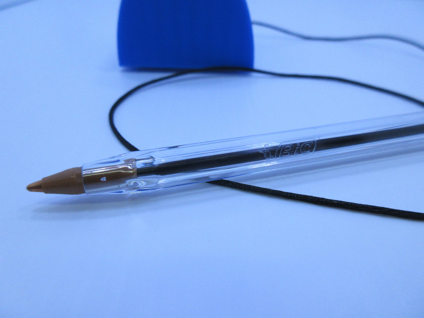 1 x Bic Cristal BLACK INK Ball Point 1.0mm Medium Nib with Black Cord  with Blue stand/pen holder